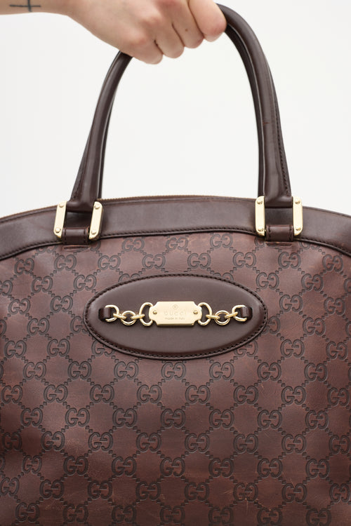 Gucci Brown Leather Monogram Embossed Bag