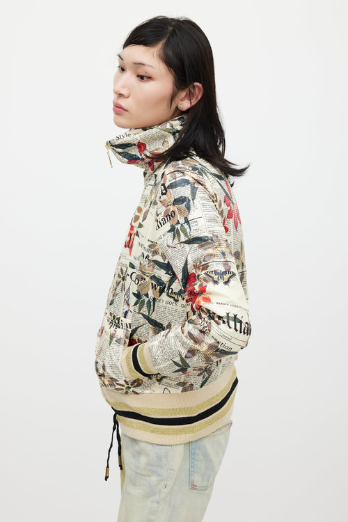 Galliano Cream 
Multicolour Floral Newsprint Bomber Jacket