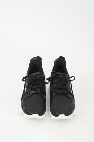 Givenchy Black 
White Leather Jaw Low Sneaker