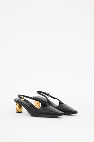 Givenchy Black 
Gold Leather G Cube Heel