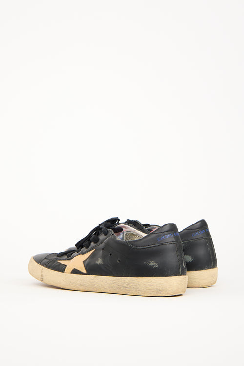 Golden Goose Black 
Gold Leather Superstar Sneaker