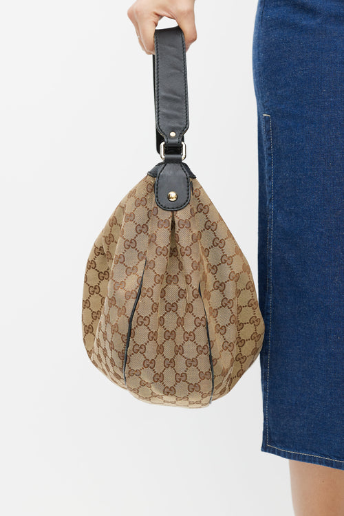 Gucci Brown 
Black Sukey Monogram Bag