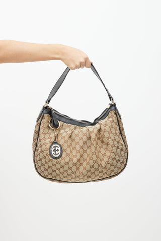 Gucci Brown 
Black Sukey Monogram Bag