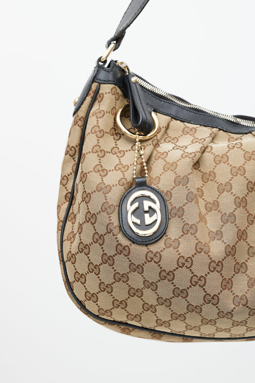 Gucci Brown 
Black Sukey Monogram Bag