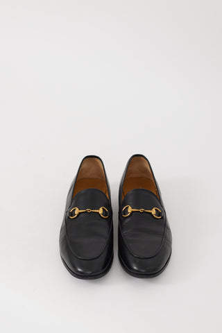 Gucci Black 
Gold Leather Jordaan Loafer