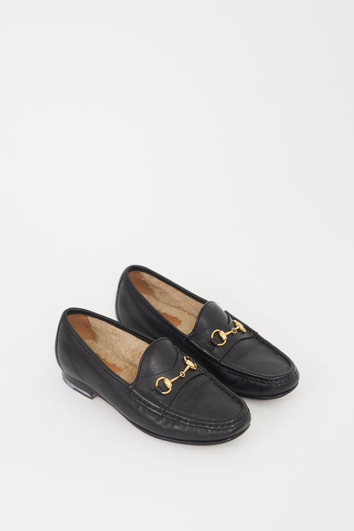 Gucci Black 
Gold Shearling Loafer