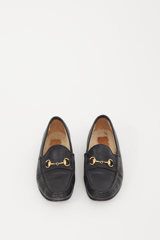 Gucci Black 
Gold Shearling Loafer