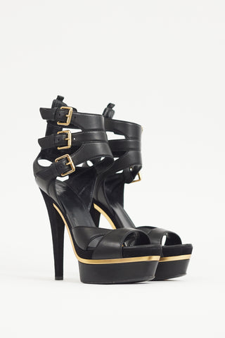 Gucci Black 
Gold Leather Platform Sandal