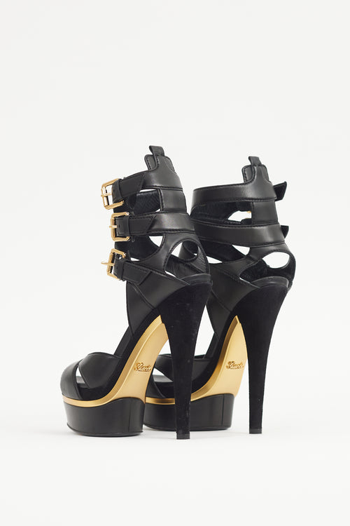 Gucci Black 
Gold Leather Platform Sandal