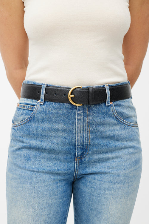 Gucci Black 
Gold Textured Leather Belt