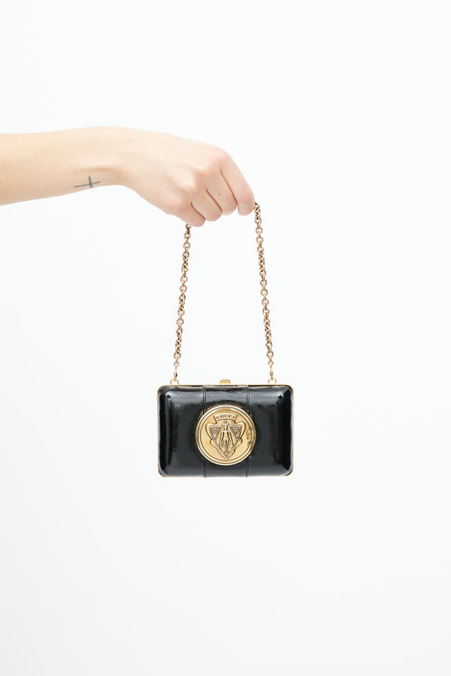 Gucci Black 
Gold Leather Clutch