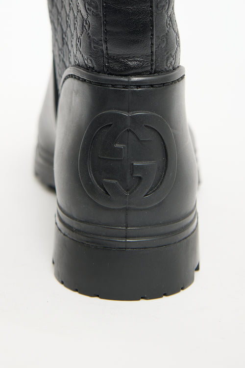 Gucci Black Rubber 
Monogram Leather Boot