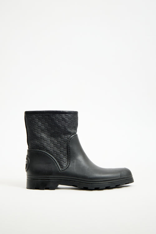 Gucci Black Rubber 
Monogram Leather Boot