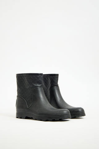 Gucci Black Rubber 
Monogram Leather Boot