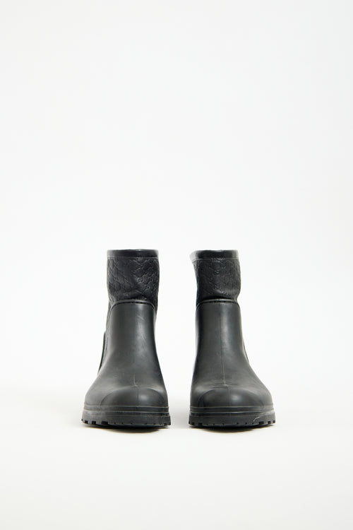 Gucci Black Rubber 
Monogram Leather Boot