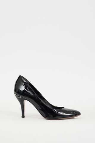 Gucci Black 
Silver Patent Leather Hardware Heel