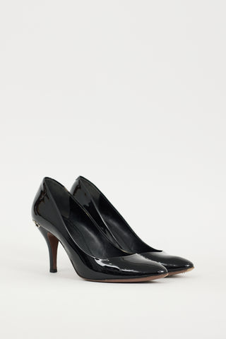 Gucci Black 
Silver Patent Leather Hardware Heel