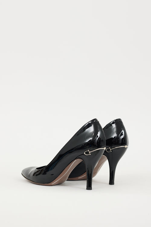 Gucci Black 
Silver Patent Leather Hardware Heel