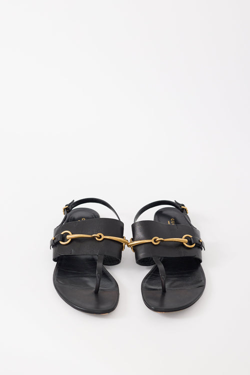 Gucci Black Leather 
Gold Hardware T-Strap Sandal