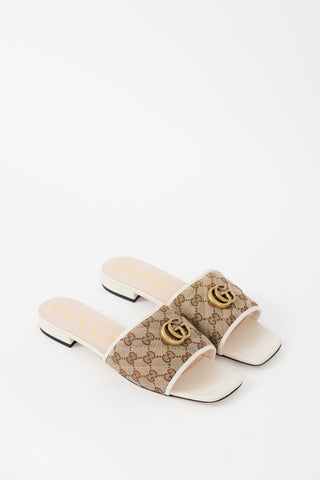 Gucci Cream 
Beige GG Canvas 
Leather Marmont Slide