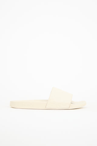 Gucci Cream Leather 
Rubber Microguccissima Slide