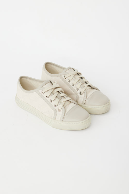 Gucci Cream Leather 
Canvas GG Sneaker