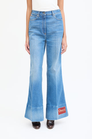 Gucci Medium Wash Logo Patch Flared Jeans