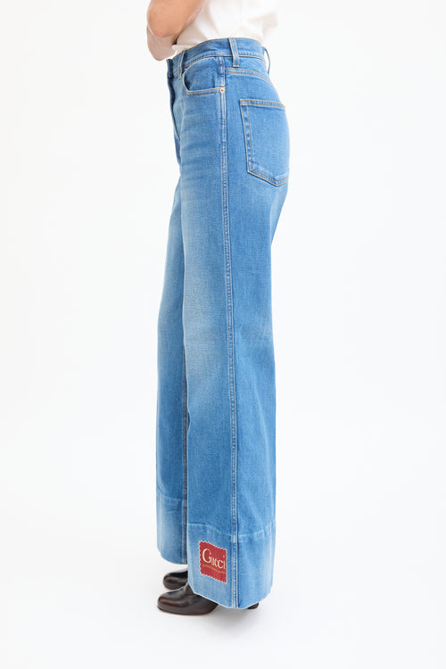 Gucci Medium Wash Logo Patch Flared Jeans