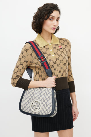 Gucci Navy 
Cream Monogram Medium Blondie Crossbody Bag