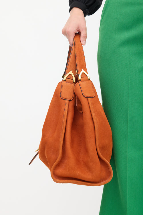 Gucci Orange Suede Stirrup Bag