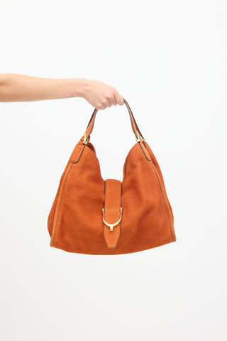 Gucci Orange Suede Stirrup Bag