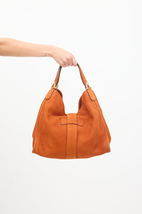 Gucci Orange Suede Stirrup Bag