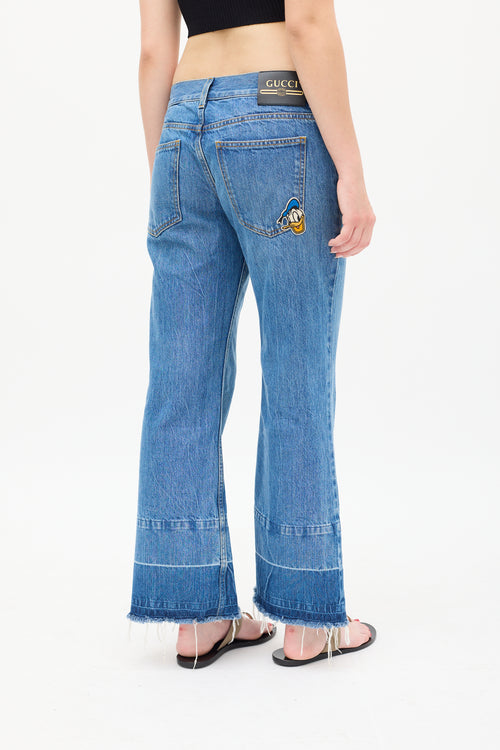 Gucci X Disney Medium Wash Patch Jeans