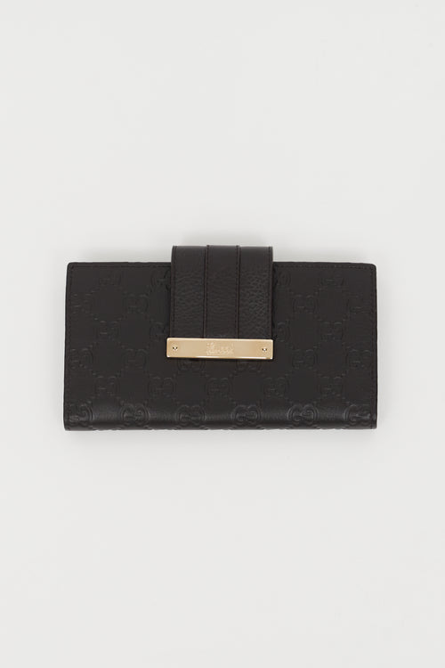 Gucci Black Monogram Flap Wallet