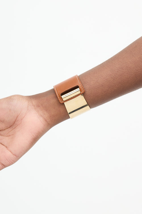 Hermès 2011 Brown Leather 
Gold Plated Cuff Bracelet