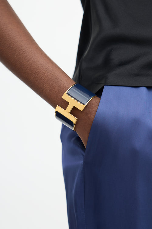 Hermès Navy 
Gold Plated Extra Wide Clic Clac H Bracelet