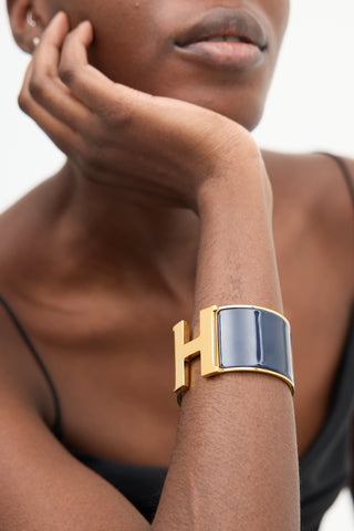 Hermès Navy 
Gold Plated Extra Wide Clic Clac H Bracelet