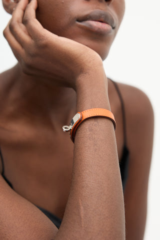 Hermès 2009 Orange Swift Leather Kelly Single Tour Bracelet