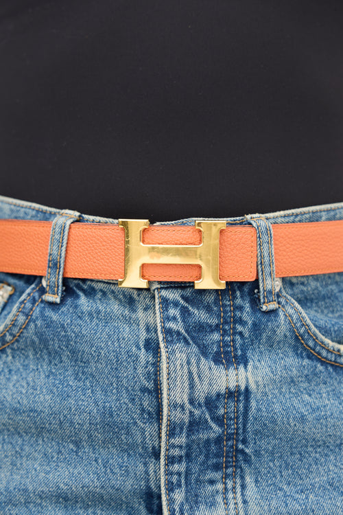 Hermès 2013 Orange Clemence 
Black Leather Reversible Constance H Belt