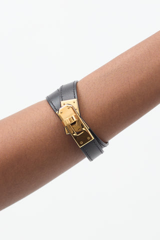 Hermès 2003 Black 
Yellow Gold Leather Kelly Double Tour Bracelet