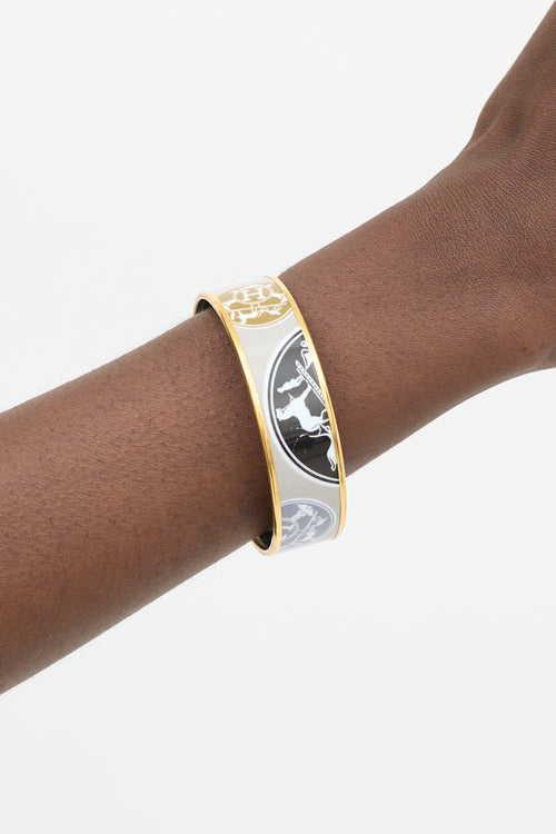 Hermès 2008 Grey 
18K Yellow Gold Enamel Print Bangle