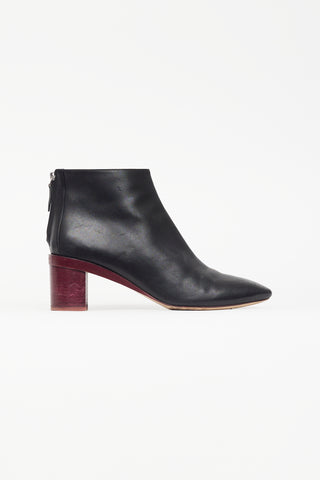 Hermès Black 
Burgundy Almond Toe Boot