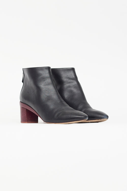 Hermès Black 
Burgundy Almond Toe Boot