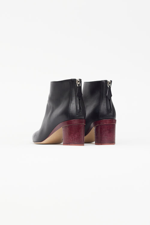 Hermès Black 
Burgundy Almond Toe Boot