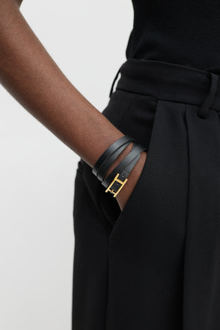 Hermès Black 
Gold Behapi Leather Wrap Bracelet