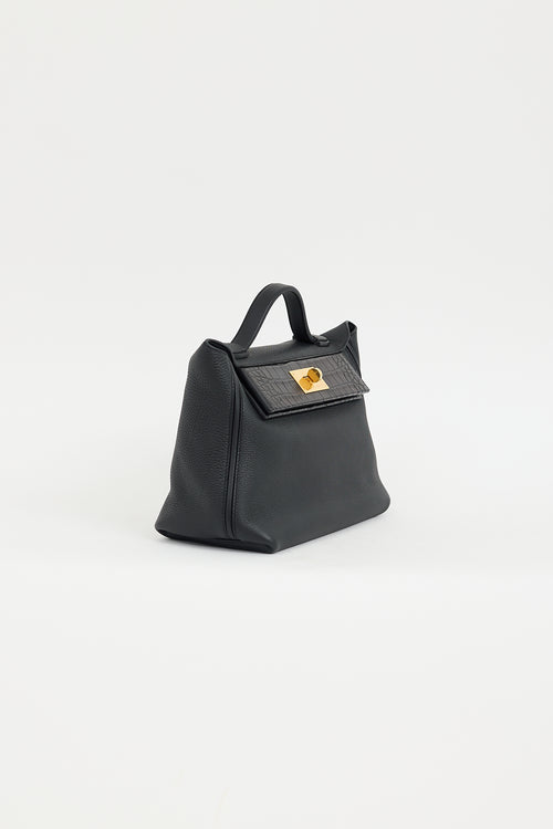 Hermès 2022 Noir Togo 
Exotic Leather 24/24 Touch Bag