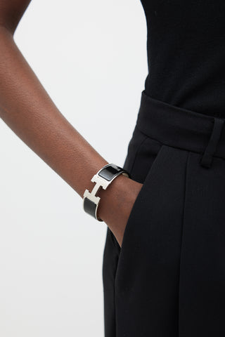 Hermès Black 
Silver Clic Clac H Bracelet