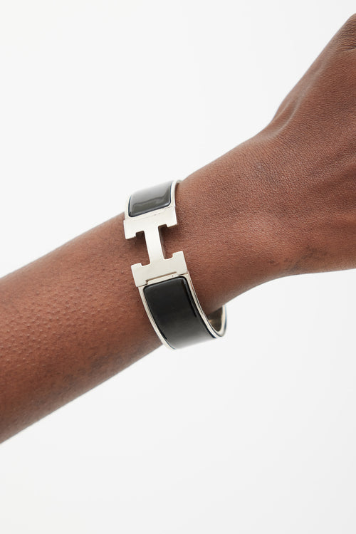 Hermès Black 
Silver Clic Clac H Bracelet