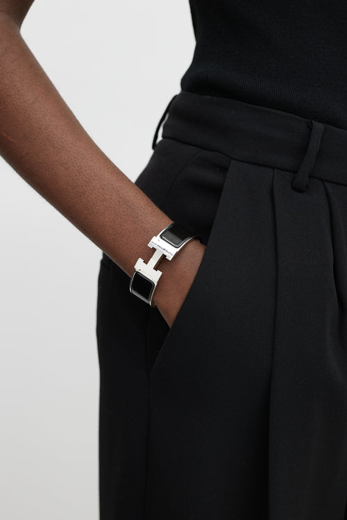 Hermès Black 
Silver Clic Clac H Bracelet