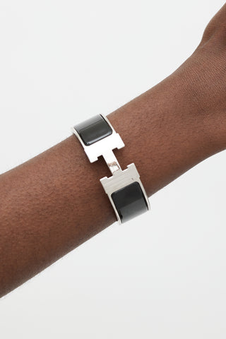 Hermès Black 
Silver Clic Clac H Bracelet